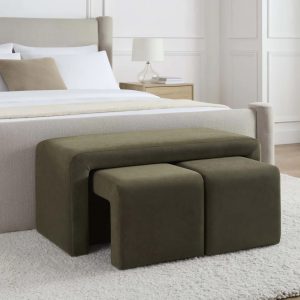 Olive green nesting bedroom bench with two matching stools tucked underneath, placed at the foot of a modern upholstered bed, offering stylish seating and space-saving functionality for small homes.